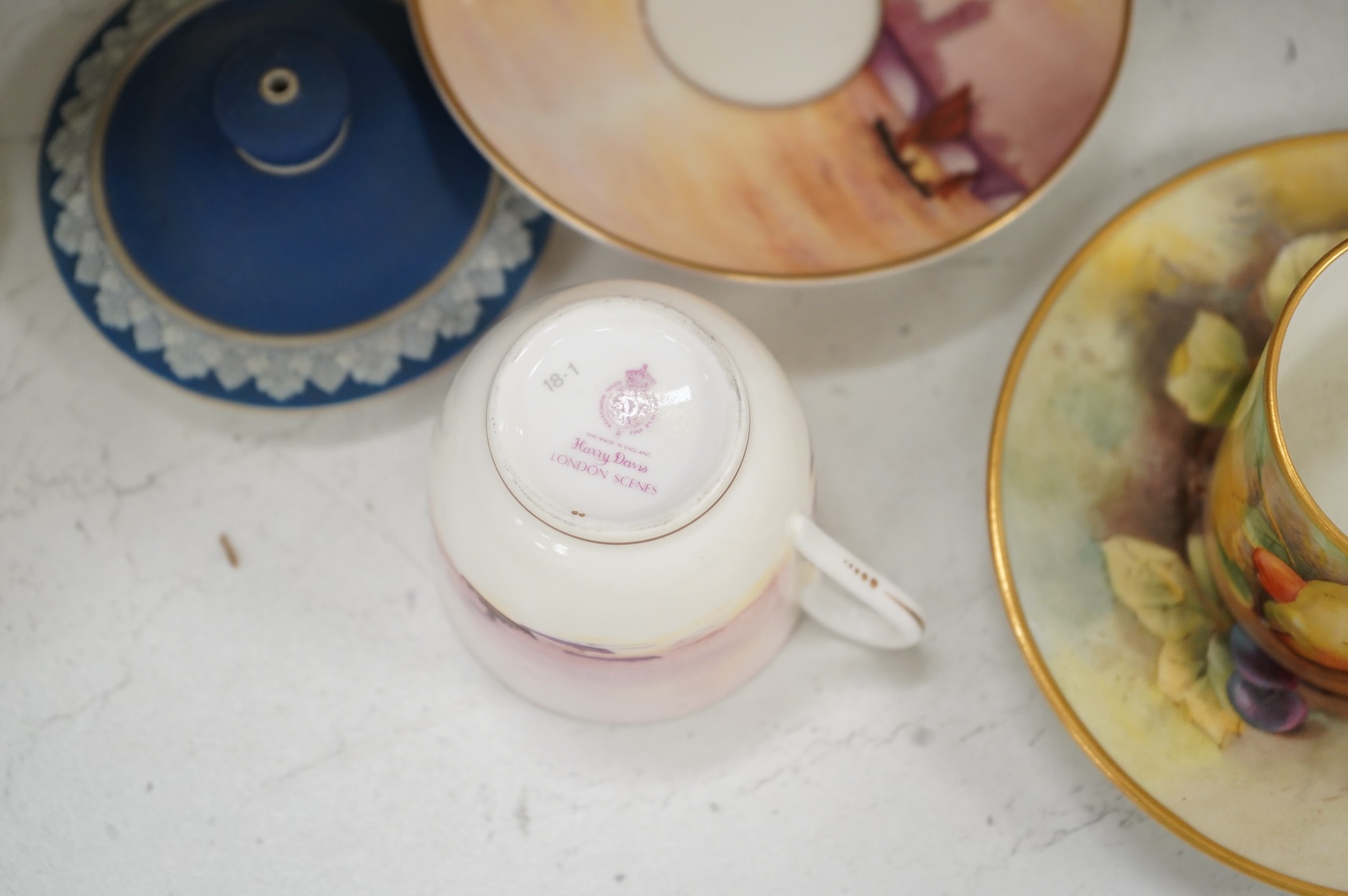 Large group of 19th/20th century English ceramics, to include a Rockingham basket, other English porcelain flower encrusted vessels, a Copeland and Garrett ewer, a Minton Sevres style beaker, a Wedgwood agate ware jug, R
